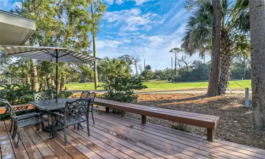 Wooden deck with a lawn