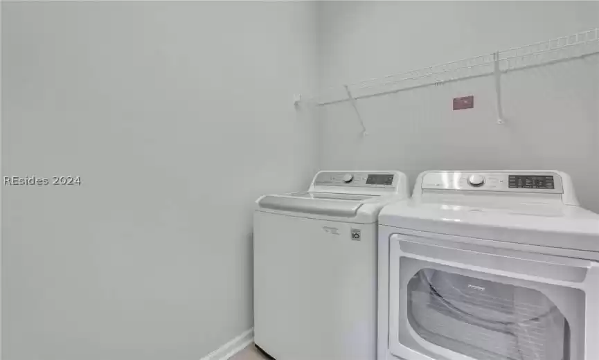 Laundry Room is conveniently adjacent to the primary bedroom and features washer and clothes dryer