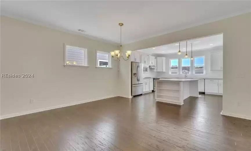 Versatile living area could be used as dining area.  Note the clerestory windows for privacy