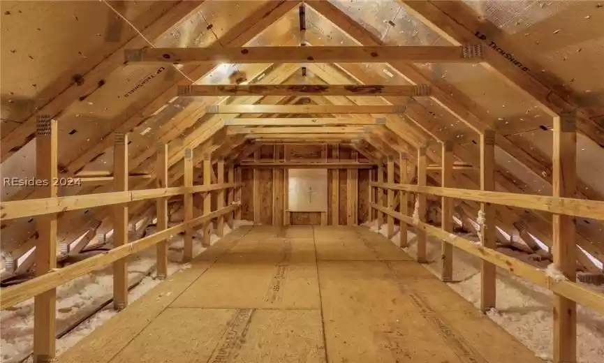 View of unfinished attic for storage