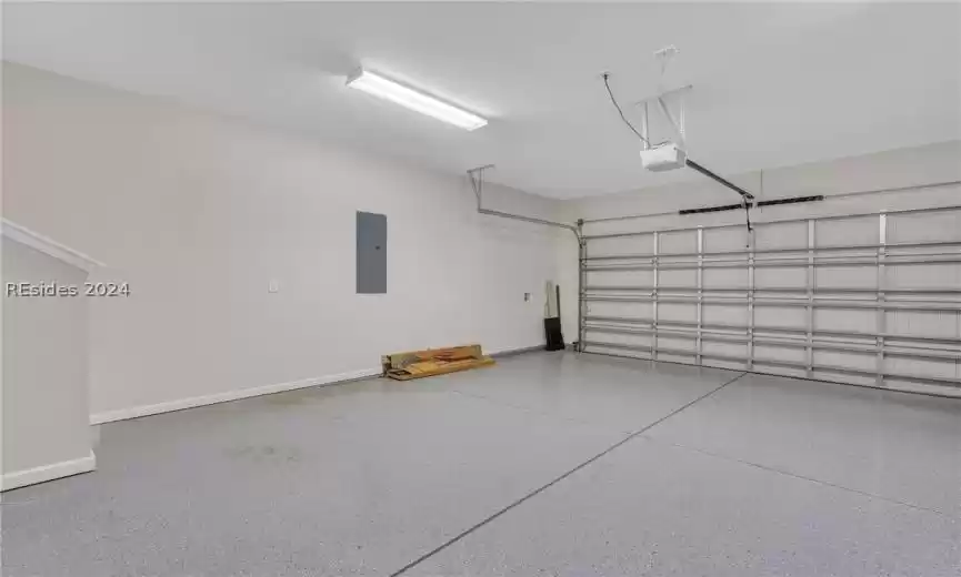 Extended garage featuring epoxy floor, and extended garage
