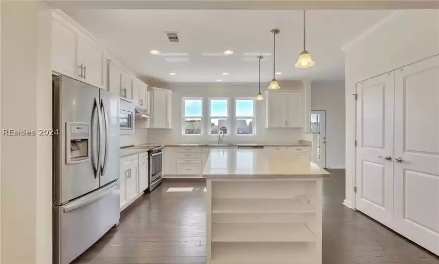 Kitchen with double doored pantry
