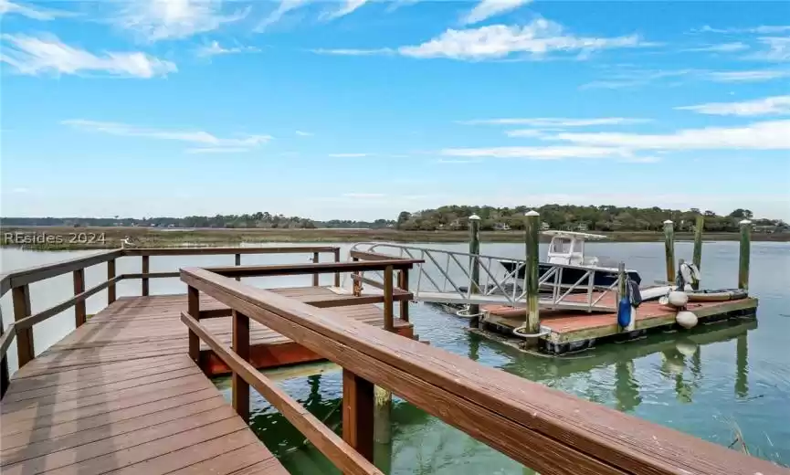 View of dock with a water view