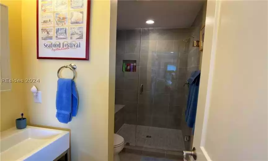 Bathroom with walk in shower.