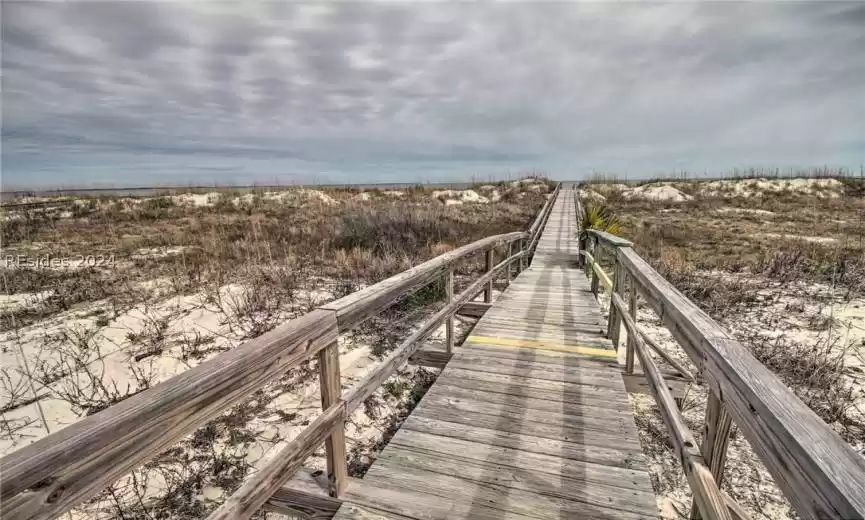 Boardwalk to private beach.