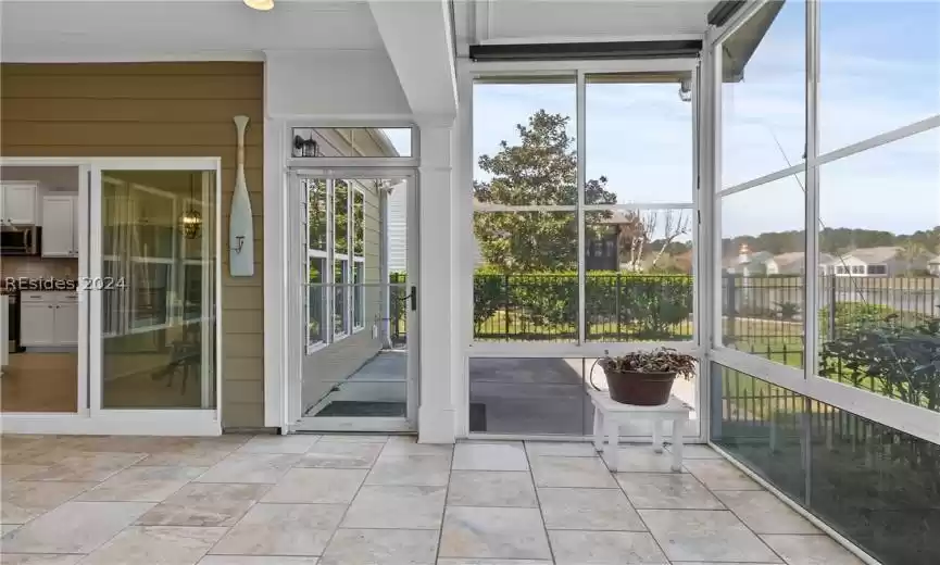 Unfurnished sunroom with a healthy amount of sunlight