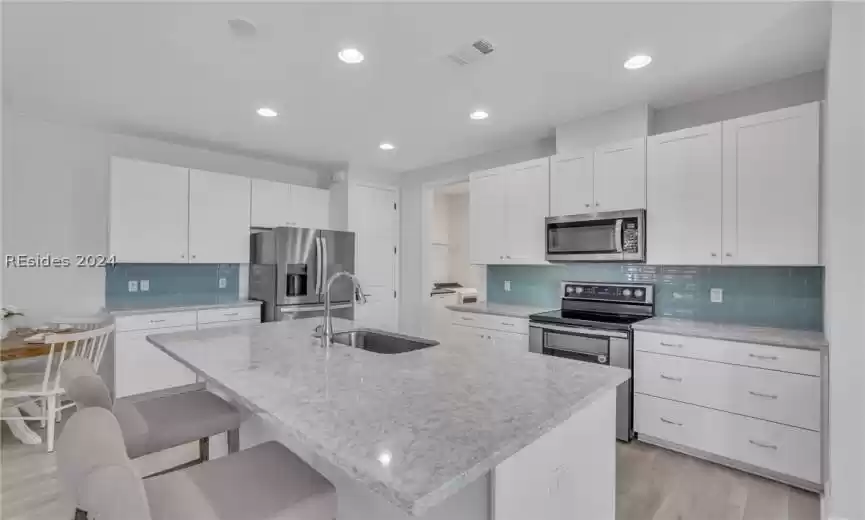 Beachy glass backsplash