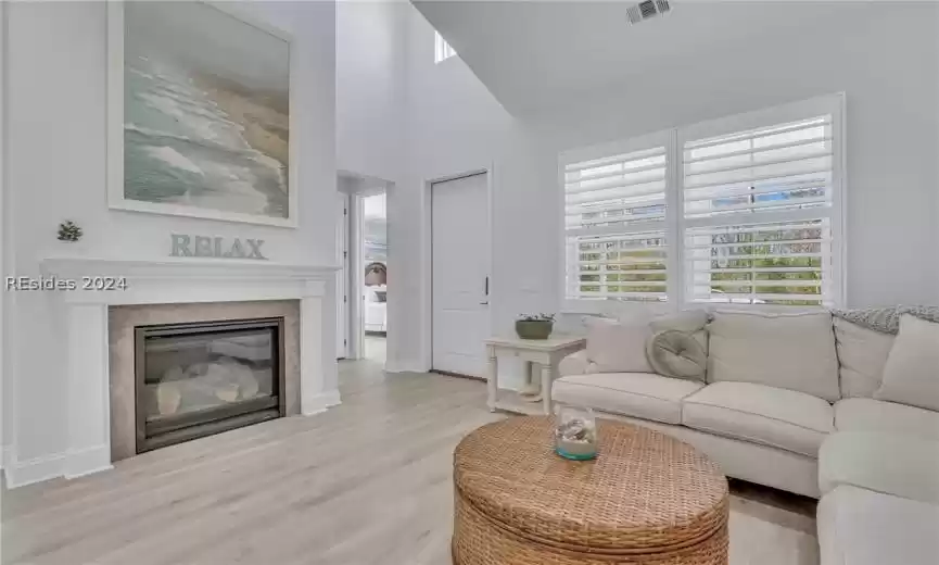 Gas fireplace and view into the guest room