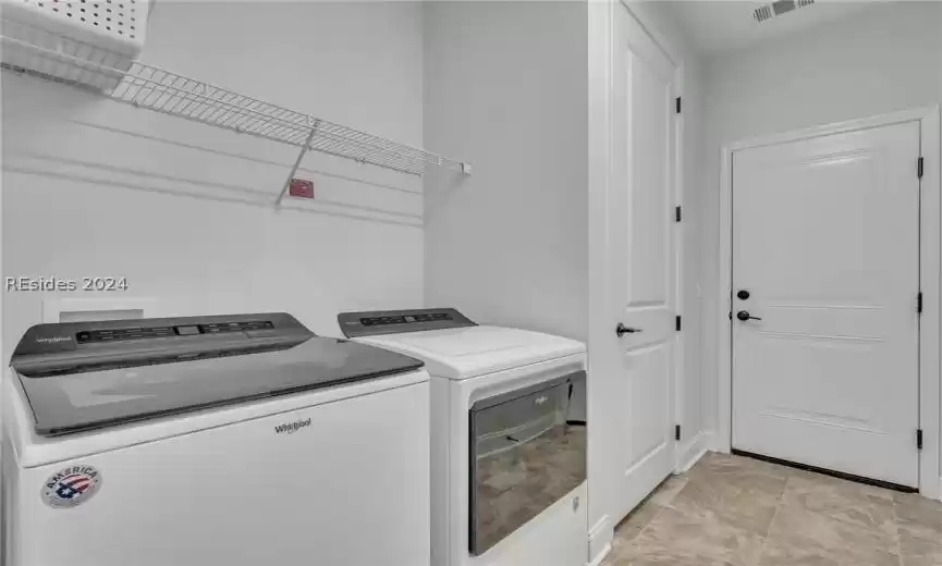 Laundry located off the kitchen