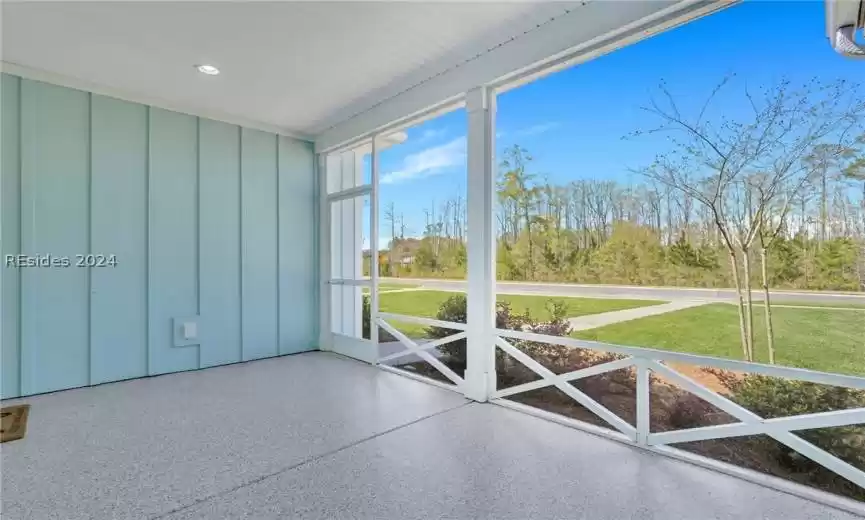 Screened porch overlooking landscape