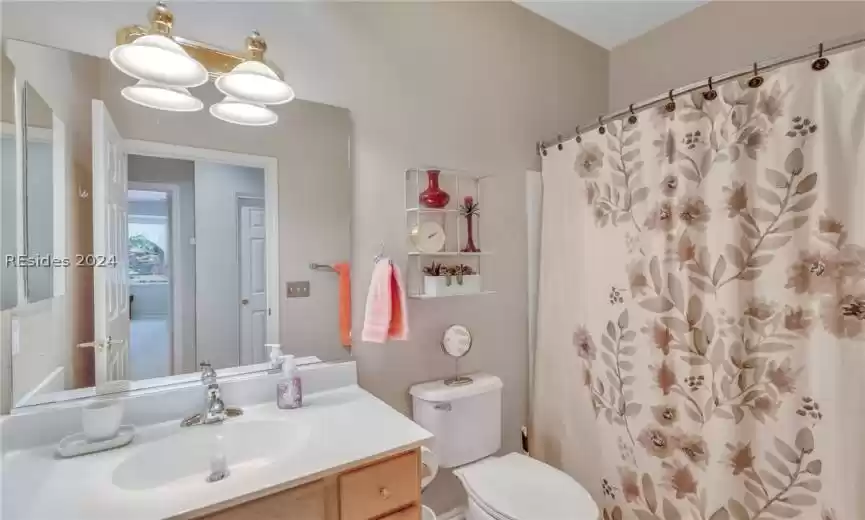 Guest bathroom located in the hallway for convenience