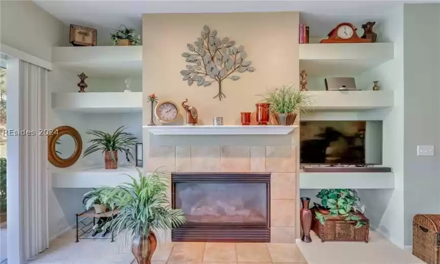 Gas fireplace with built-in shelves