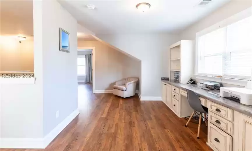 Home office / loft with built in desk.