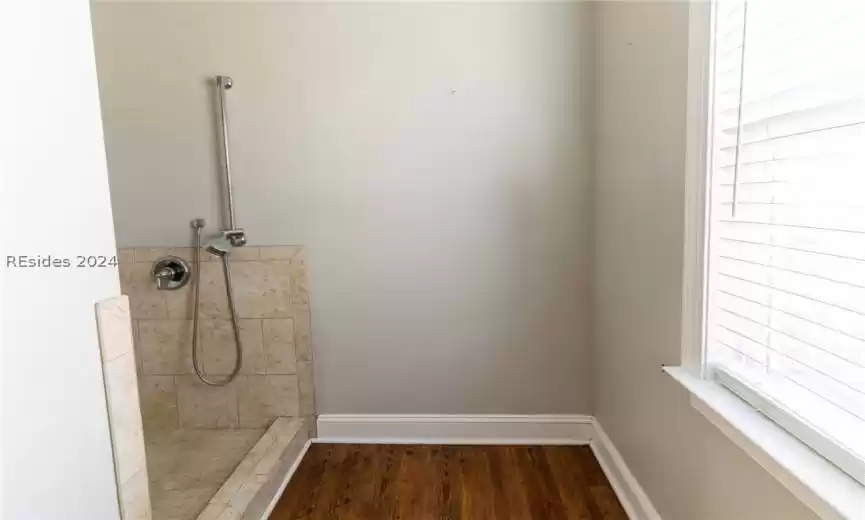 The tiled pet wash station offers practicality with a touch of luxury.