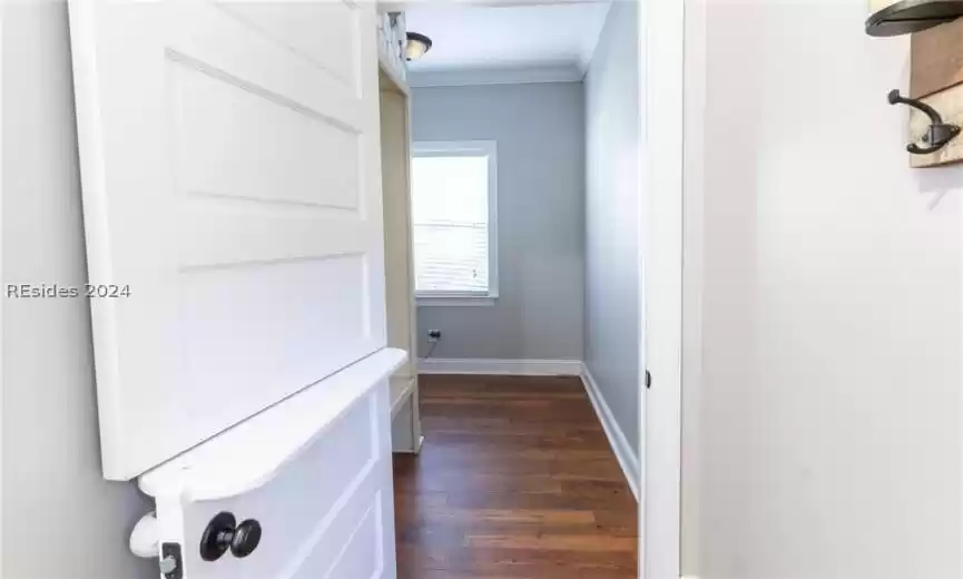 Side entrance from the garage leads to a pet wash room.