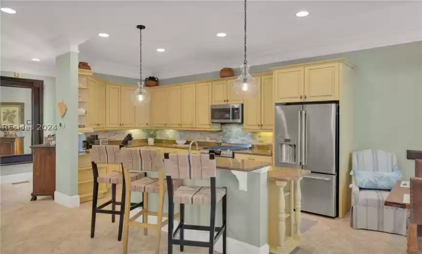 Kitchen has a wine cooler