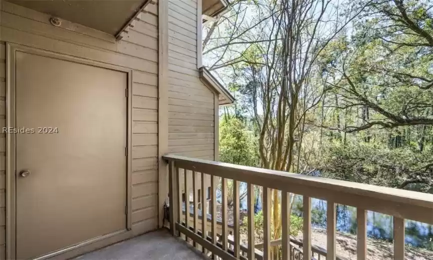 Balcony with lagoon views and outside storage area.