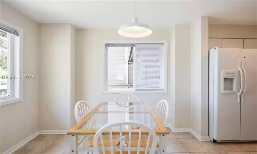 Dining area directly off of the kitchen. This area is light and bright - some units use this space as an office or bedroom.