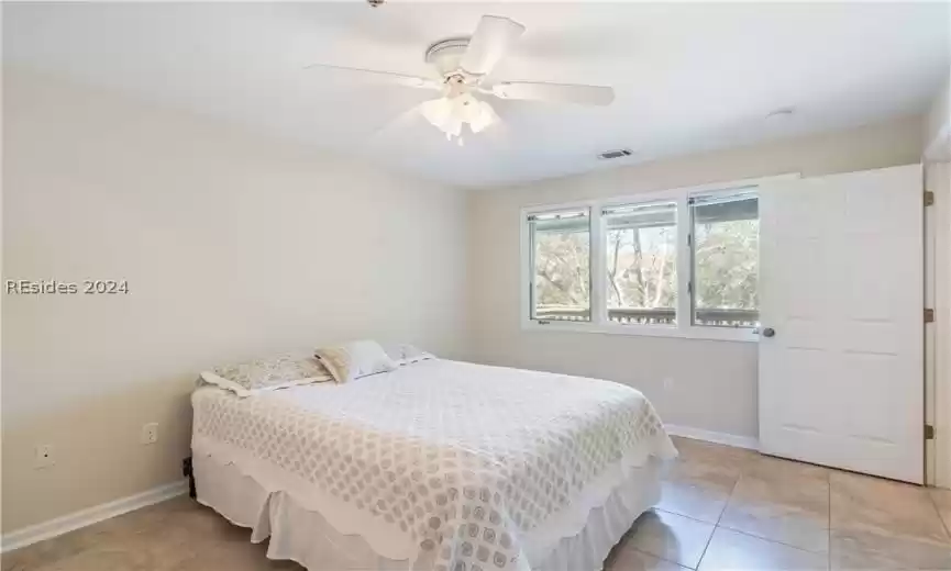 Beautiful natural light pouring into your main level bedroom.