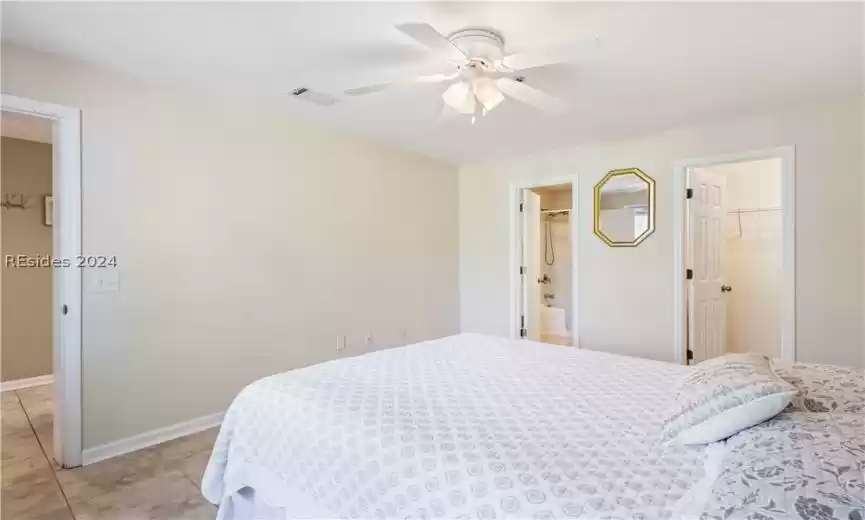 Main floor bedroom off of entryway.