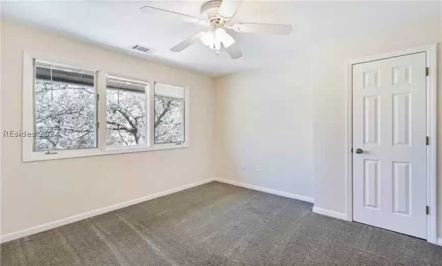 Third bedroom with plenty of storage and natural light.