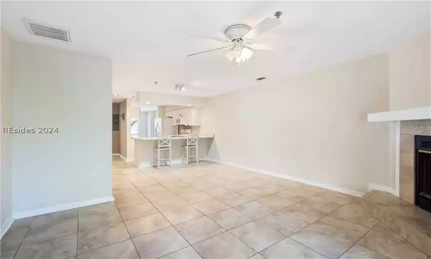  One level kitchen counter showing the smooth ceilings and freshly painted walls.