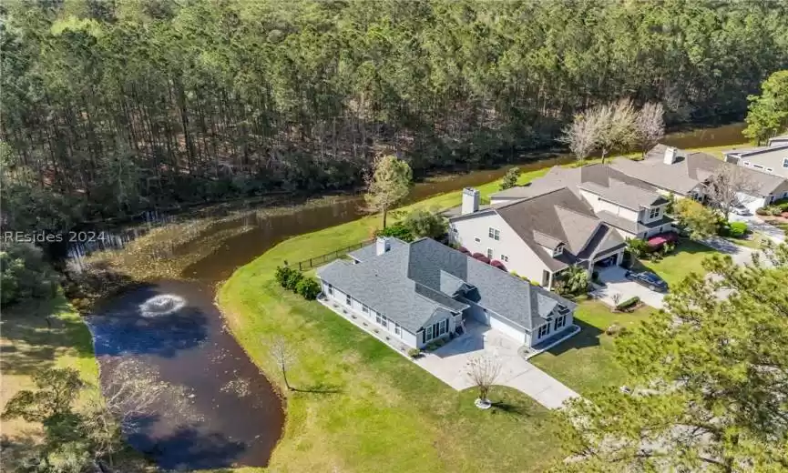 Updates, Upgrades & Special Features Galore!Feels like living on your own private island with a lovely wrap-around lagoon and wooded setting. That's 13 Sorrelwood Lane in Rose Hill Plantation.