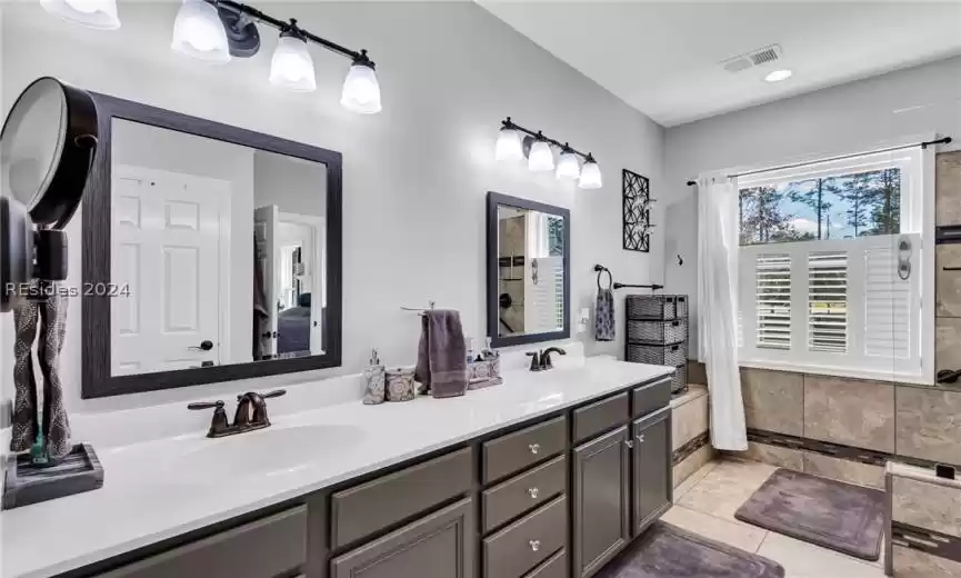 Good-sized laundry room with lots of storage and newer washer and dryer. (Washer and dryer installed in 2021).
