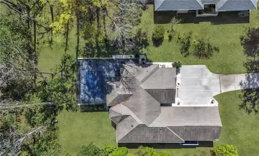 We sent the drone up a bit higher to showcase the expansiveness and privacy of this home and home site.
