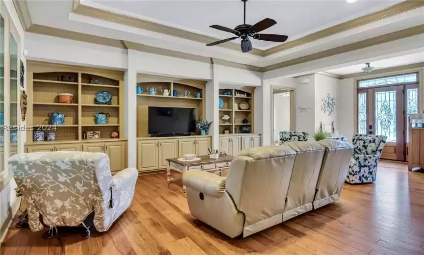 Another look at the attractive living family room/living room that features cove lighting and double crown molding. (10 ft ceilings throughout the home).