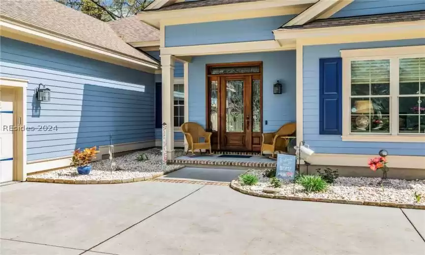 Attractive entry way welcomes you to this Picture Perfect & Best Value home. (No pine straw in beds - custom stone installed).