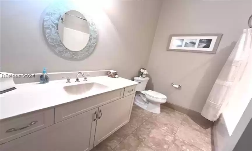 A wide angle look at the second guest bathroom.