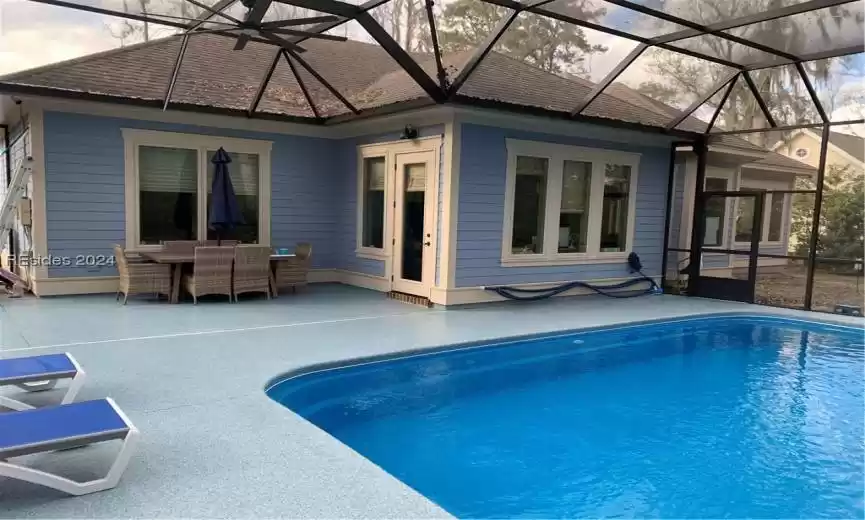 With 119,000 BTU pool heater you can enjoy a comfortable swim all year round. (Table and chairs for an outdoor snack).