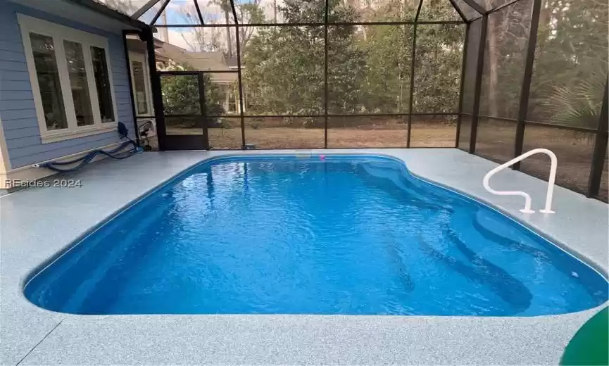 Barrier Reef Fiberglass 25x15 built-in salt water pool, heated, under water lights, 3 to 5 1/2 ft deep. Enjoy a dip or swim in total comfort. (Installed in 2022).