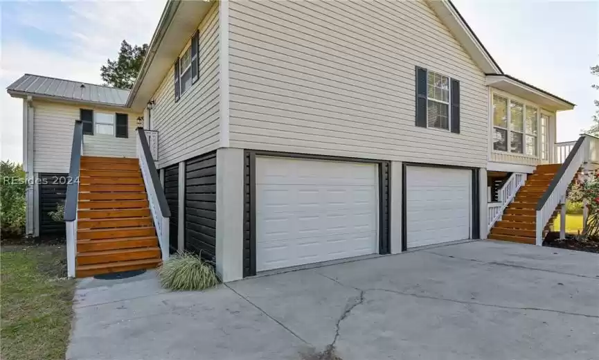 Large Extended garage with parking for multiple cars or small boat