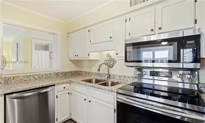 Lots of cooking space with granite countertops
