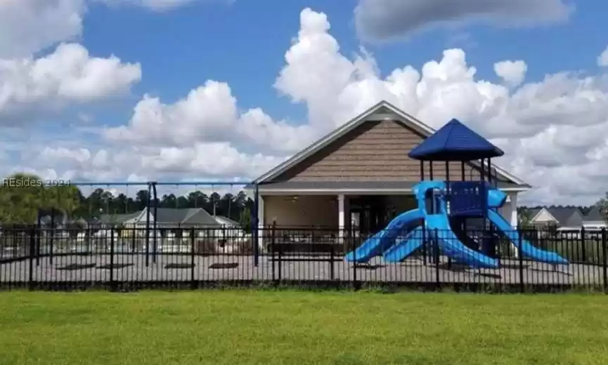View of jungle gym featuring a yard