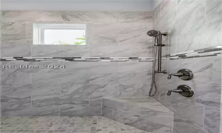 Bathroom with a tile shower