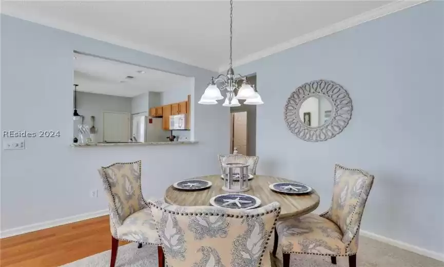 Dining space featuring a pass through to the kitchen.