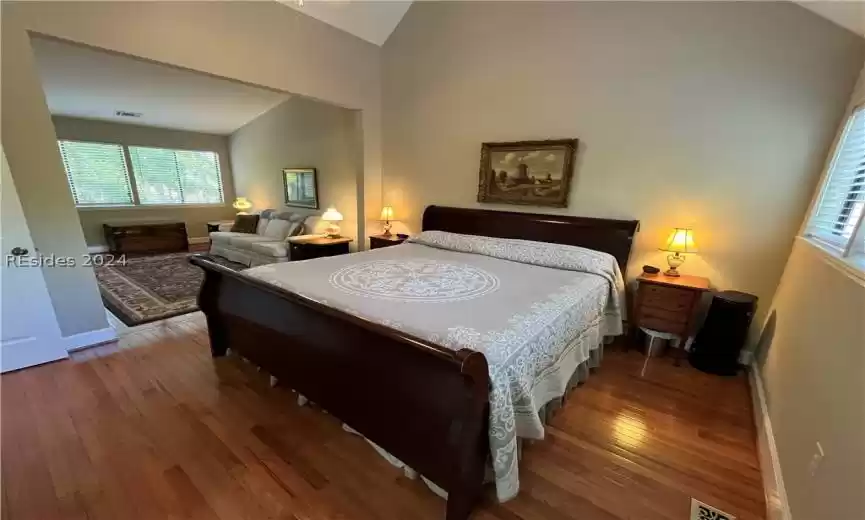 Bathroom featuring tile flooring, double sink, and vanity with extensive cabinet space