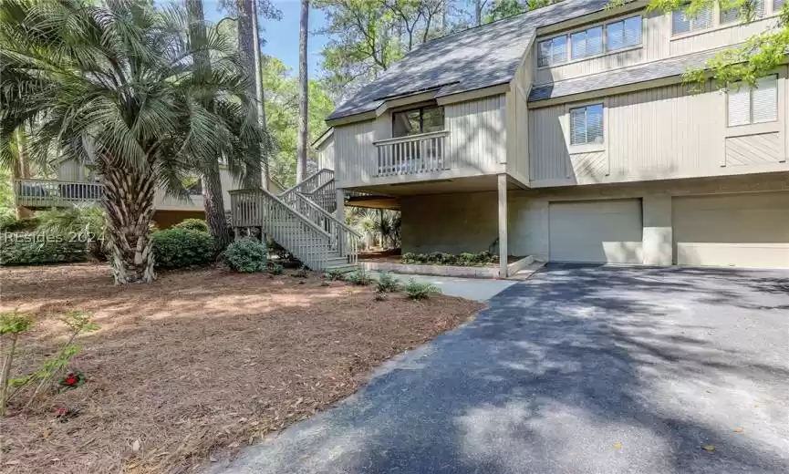 View of property with a garage