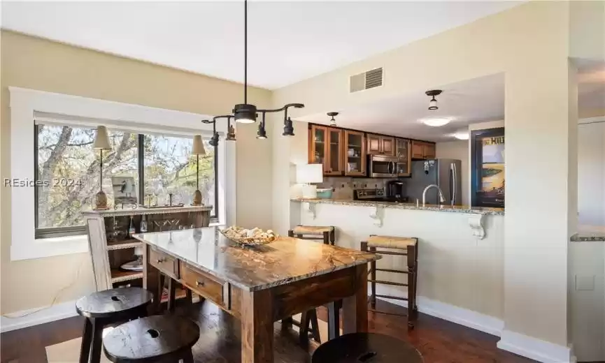 Kitchen was renovated to accommodate the stunning views, enjoy the open kitchen area with guests.