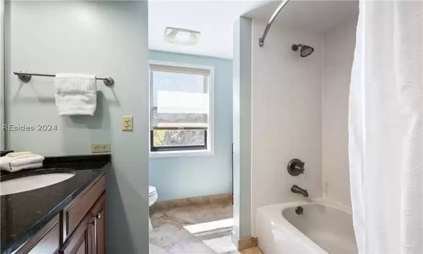 Second bathroom sit in tub and shower.