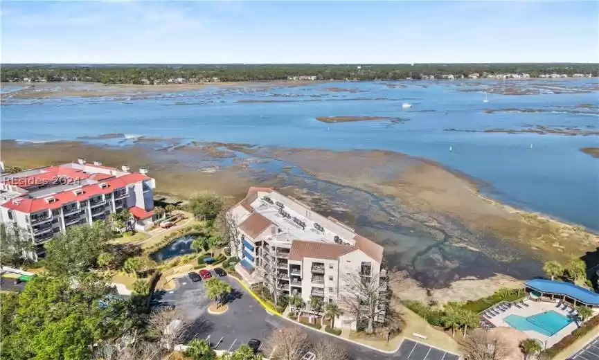 Aerial view of Captain's Quarter's building, and amenities.