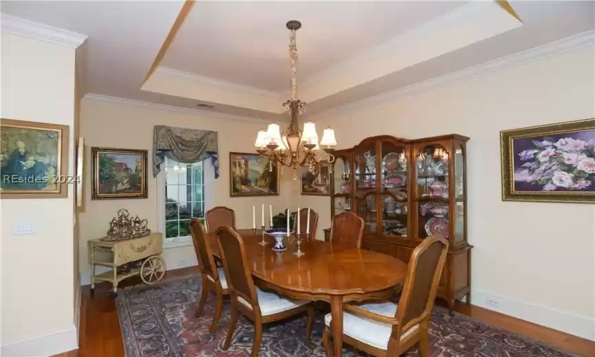 Dining area featuring a chandelier, 5