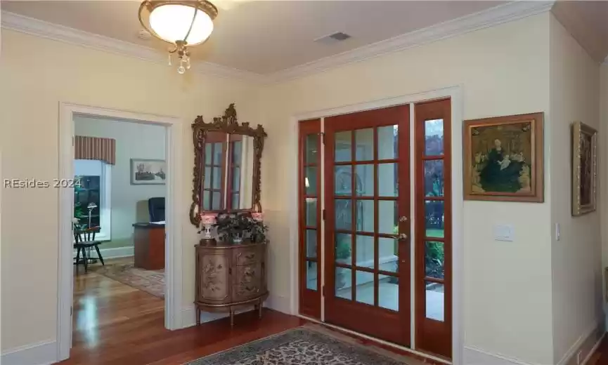 Doorway to front porch featuring 5