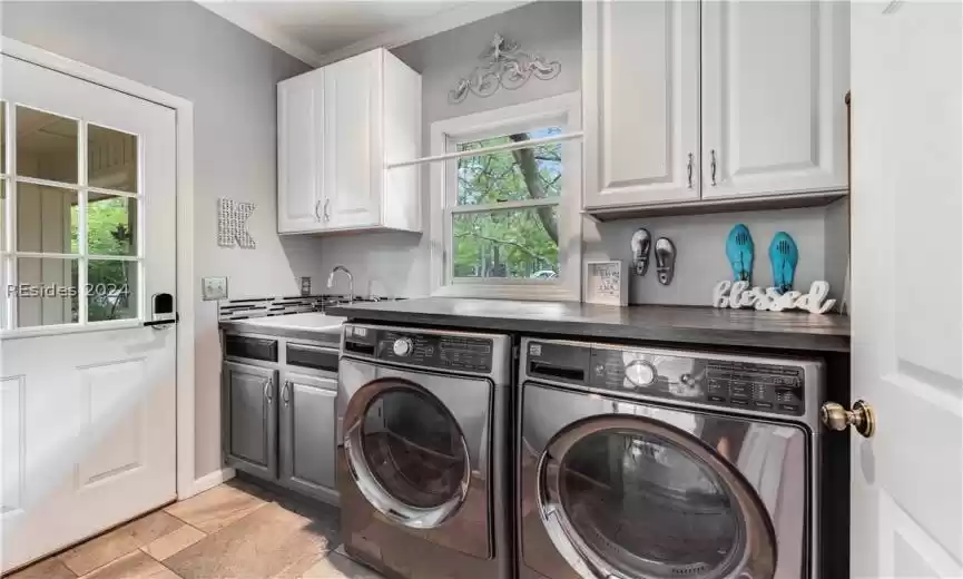 Conveniently off the breezeway from the garage leading into the kitchen. Remodeled in 2019.