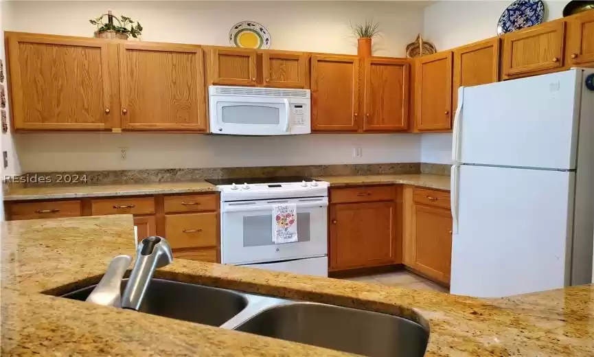 The laundry is located in the garage and has a laundry sink. The washer and dryer do not go with the house.