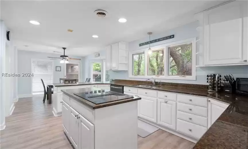 Great Sized Kitchen with granite counters and lots of natural light.