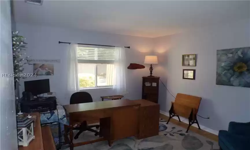 Third Bedroom with manufactured wood floors.